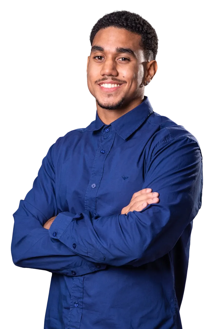 Victor Camargo smiling, arms crossed